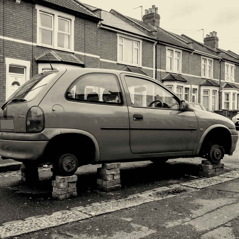 Website audit: Car without wheels, propped up on bricks